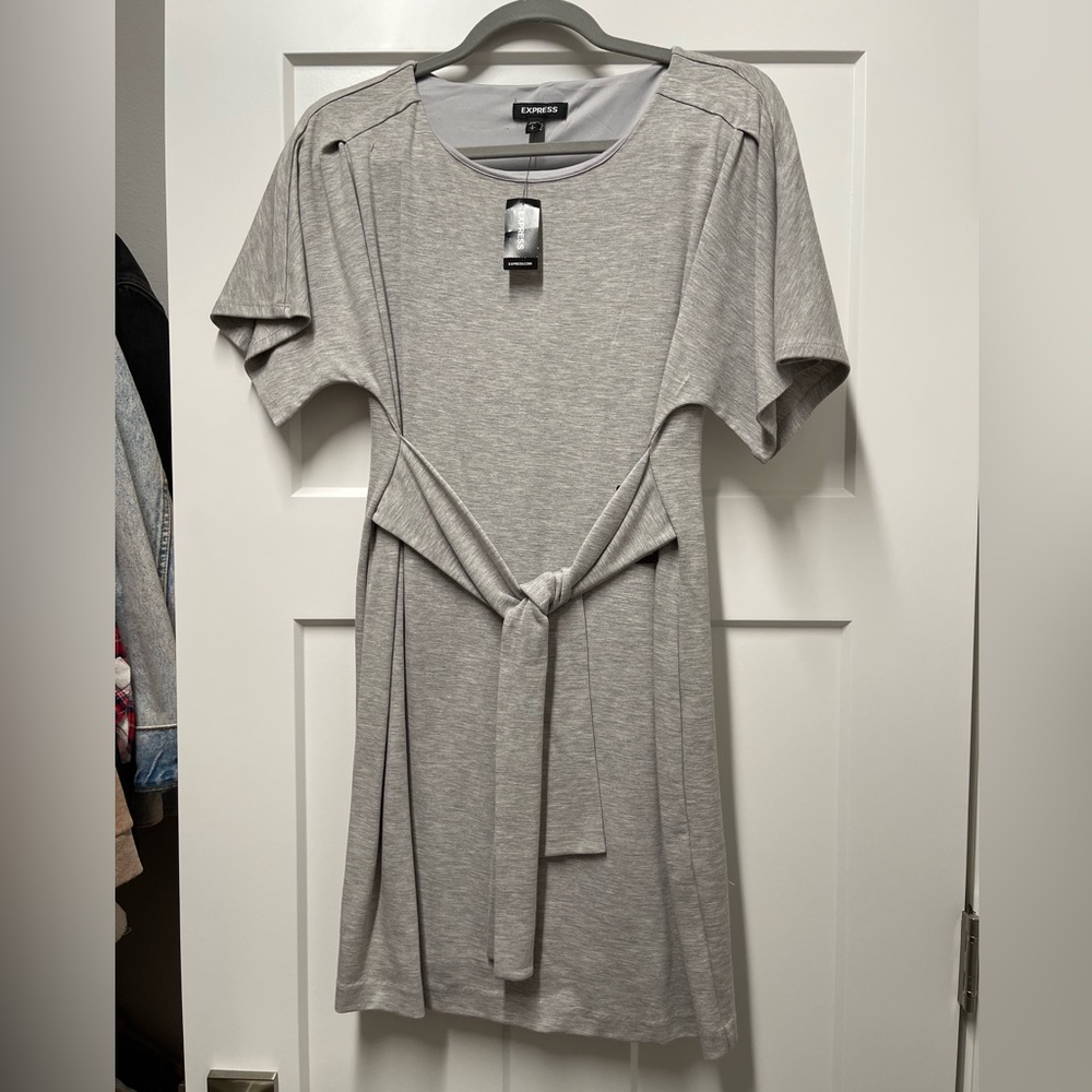 Grey short sleeve dress with belt attached.  Brand new with tags!
